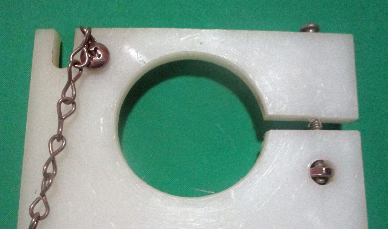 Bracket, Sanitary w/Two 1 1/2" Plugs w/Chains 6 close up