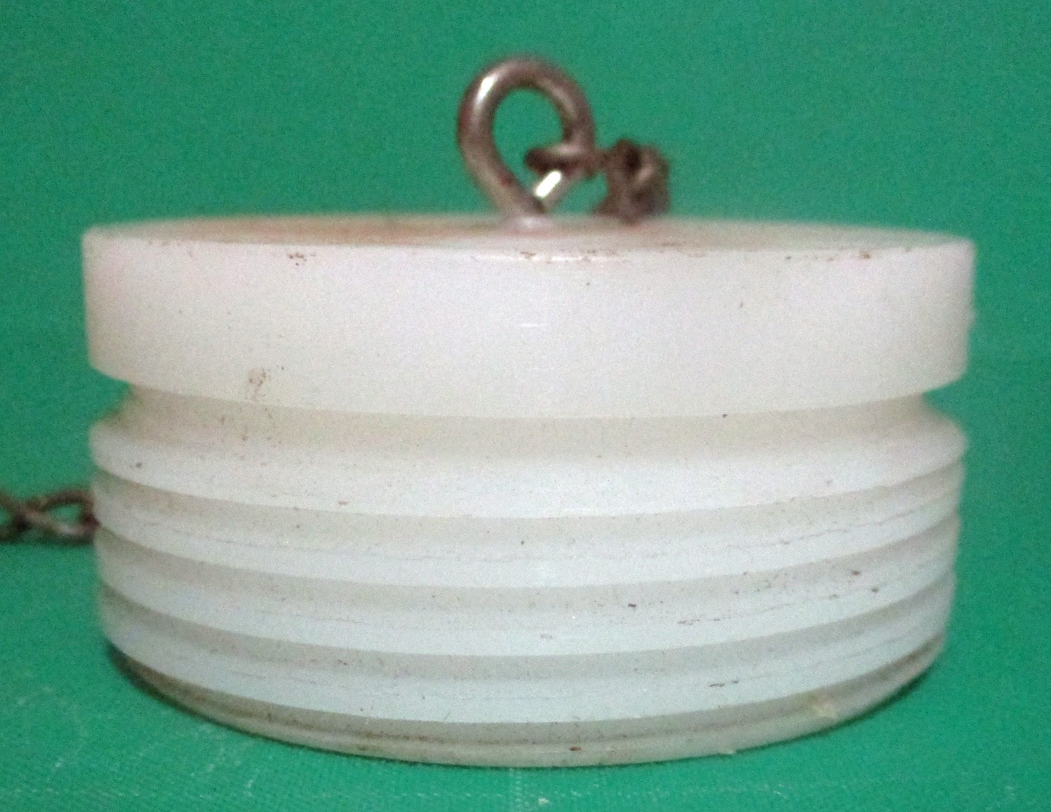 Bracket, Sanitary w/Two 1 1/2" Plugs w/Chains 7 close up