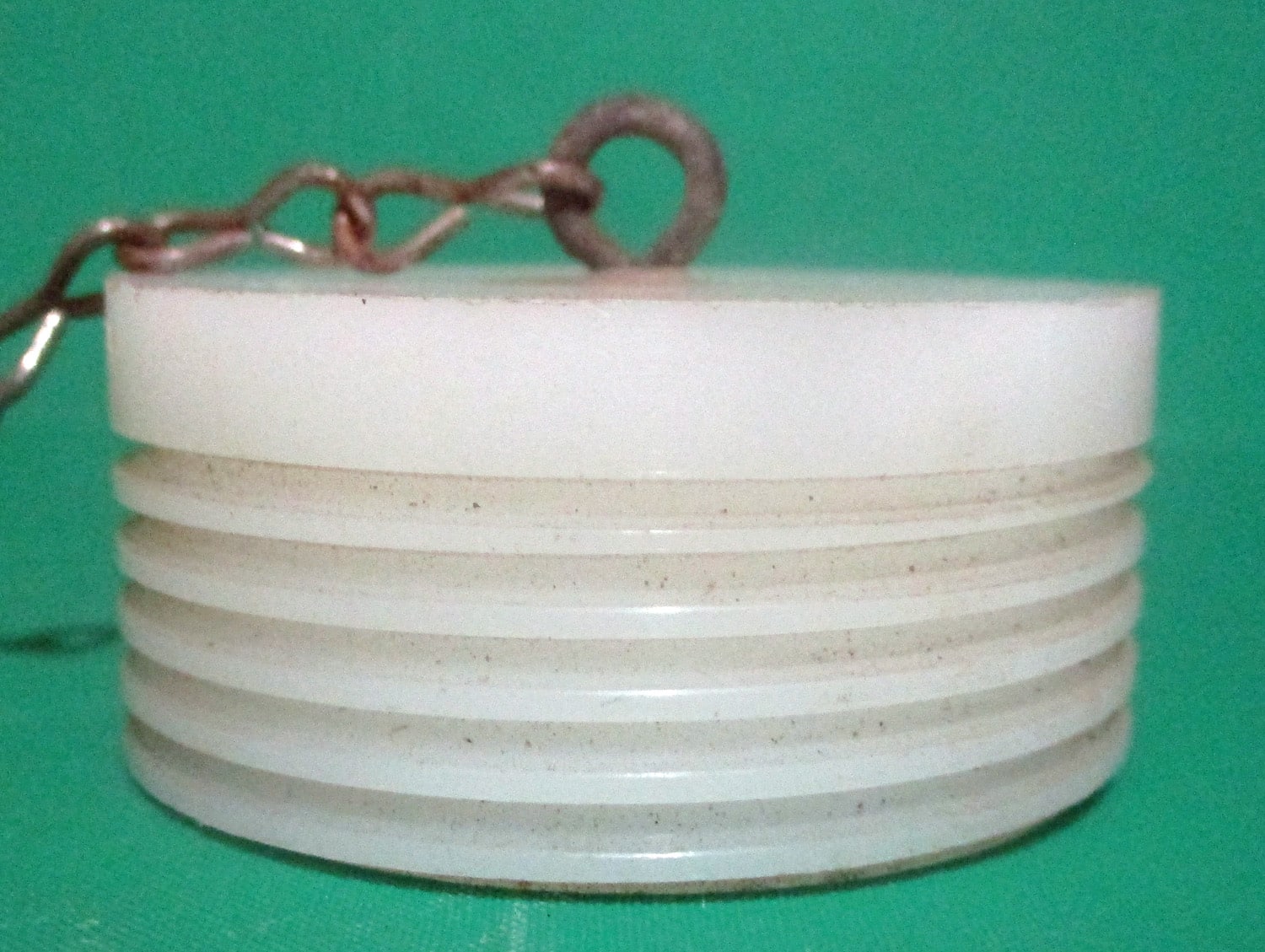 Bracket, Sanitary w/Two 1 1/2" Plugs w/Chains 8 close up