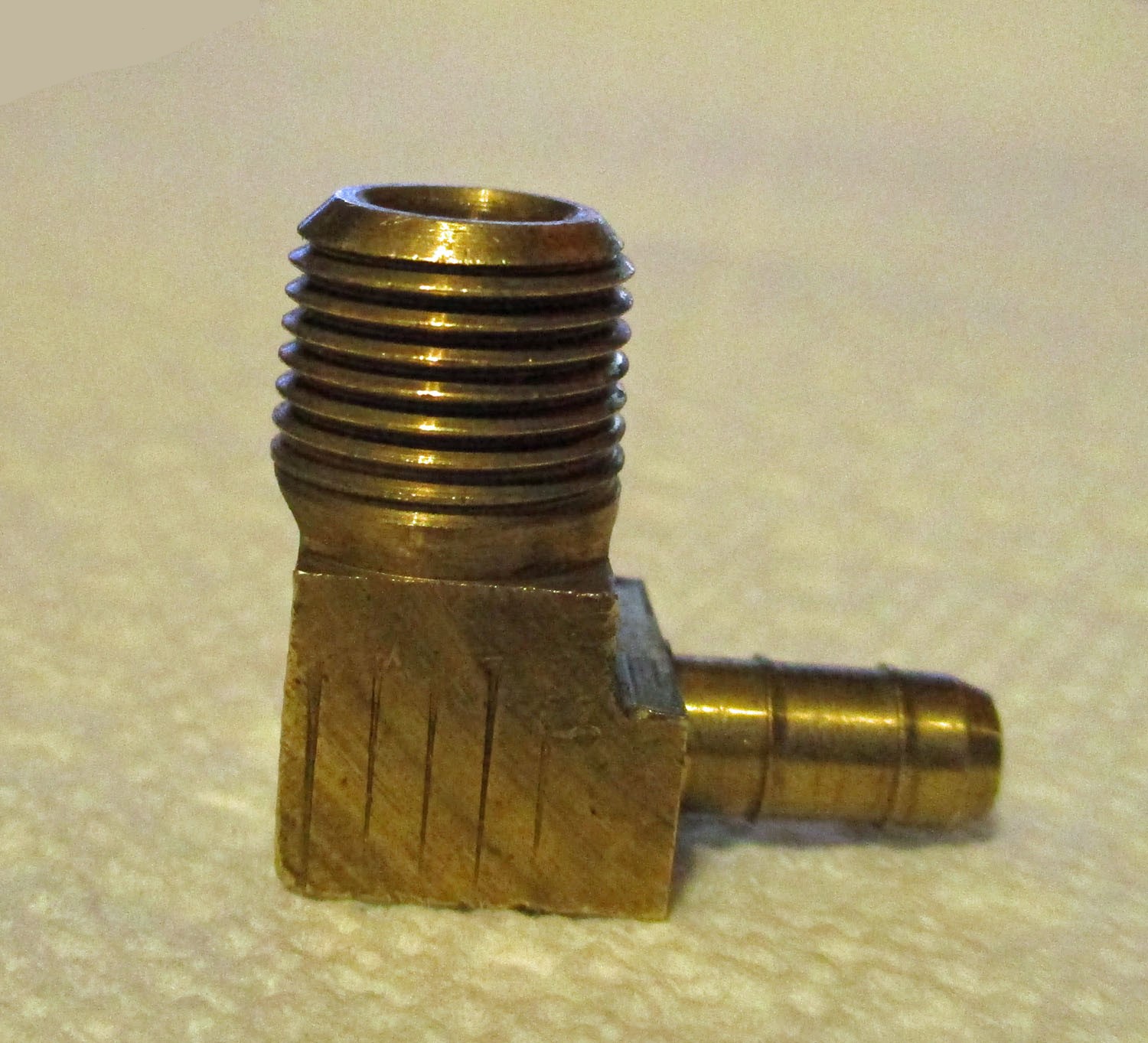 Elbow, Male .125NPT by .25 Barbed 4 Elbow Male by Barbed .125NPT by .25